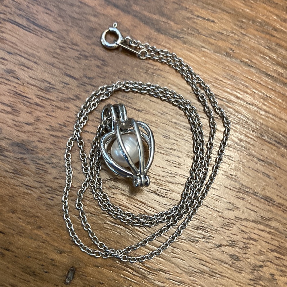 Pearl In Cage Pendant